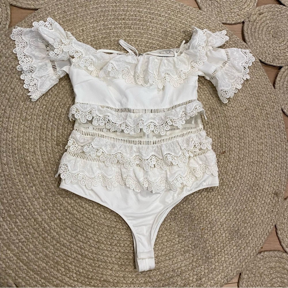 Alpha & omega white OFF-SHOULDER RUFFLE BODYSUIT M